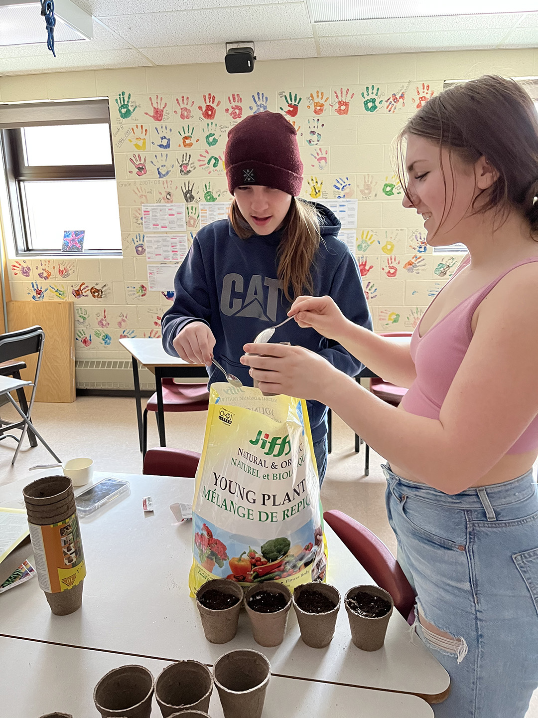 Cambridge-Narrows Community School students in the Climate Action Group grow plants as part of ongoing sustainability initiatives at the school.