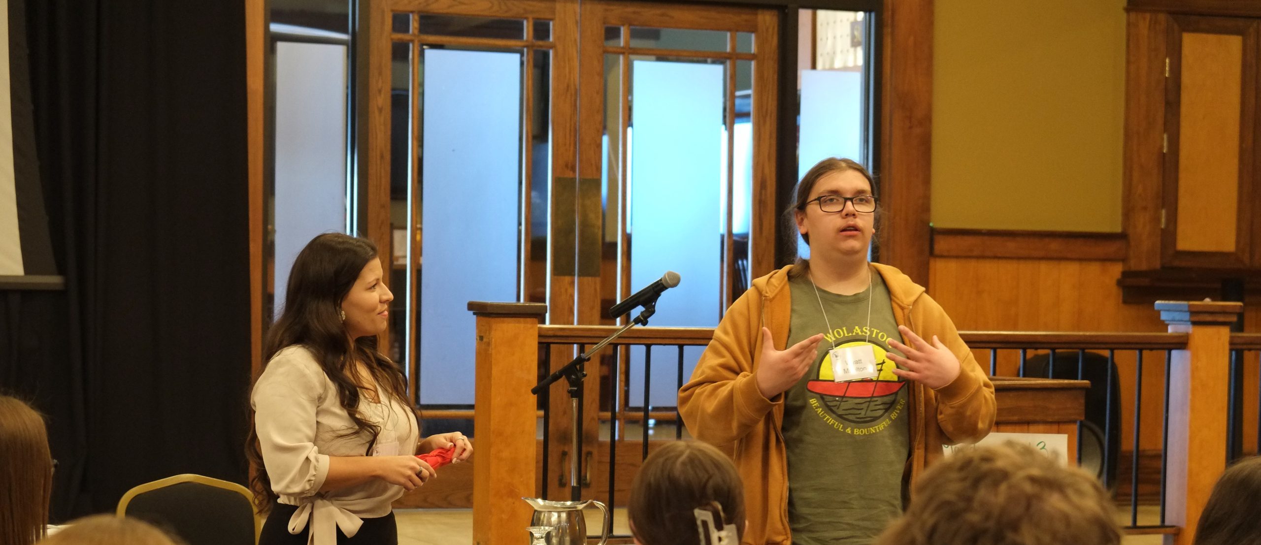 Sarah Francis, ASD-W Subject Coordinator for Curriculum & Instruction and First Nations Culture & Programs, listens as a student leader speaks to his fellow student leaders.