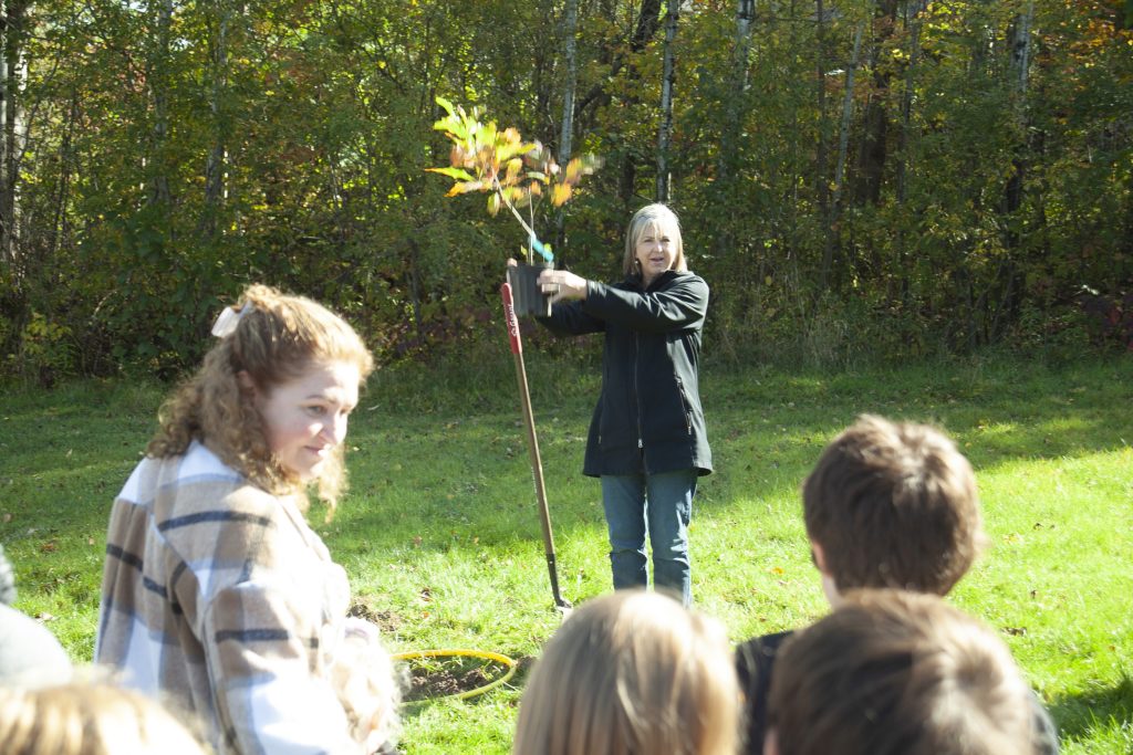 A teacher talks to students at Kingsclear Community School during Take Me Outside Day, Oct. 18, 2023.