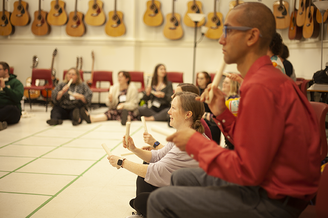 Teachers participate in a percussion exercise during the New Brunswick Music Educators Association's Atlantic Regional Conference at Fredericton High School on Saturday, Oct. 28.