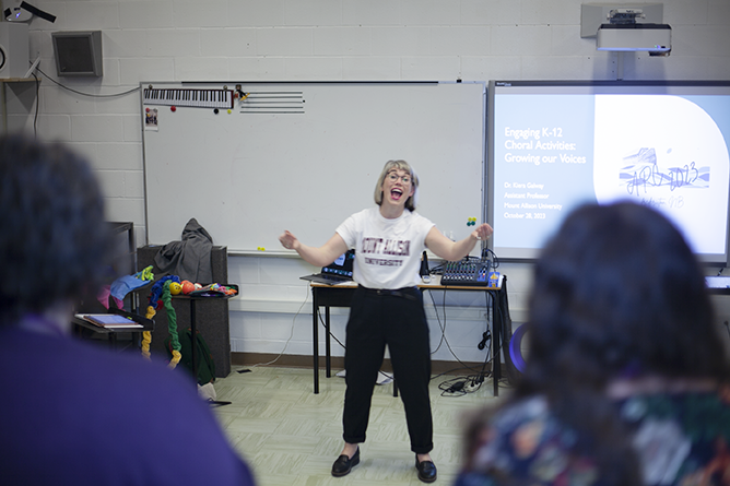 Kiera Galway, Mount Allison University’s Assistant Professor of Music Education and Choral Conducting, leading teachers in a dance during her 'Engaging K-12 Choral Activities' presentation during the New Brunswick Music Educators Association's Atlantic Regional Conference at Fredericton High School on Saturday, Oct. 28.