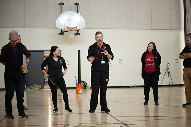 ASD-W Director of First Nations Culture & Programs Sarah Francis and Health and Physical Education Coordinator Ross Campbell explain the rules of a game of Indigenous origin to educators at CPSN's  Playful Schools Atlantic Gathering in Education, Friday, Dec. 1, at Hanwell Park Academy.