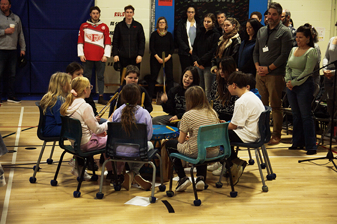 Students perform in a drum circle during the opening assembly at the annual Hubbard Elementary School Read-In on Friday, Jan. 26.