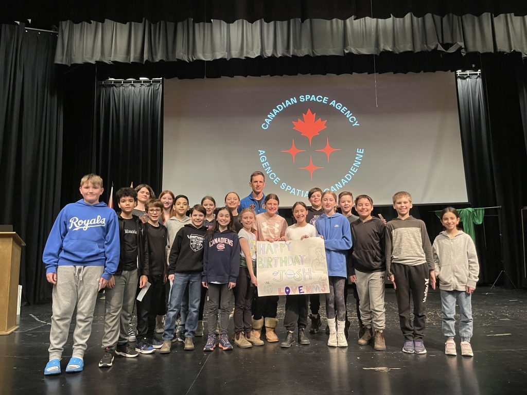 Canadian Space Agency (CSA) astronaut Joshua Kutryk with students at Nashwaaksis Middle School on Wednesday, March 20, 2024.