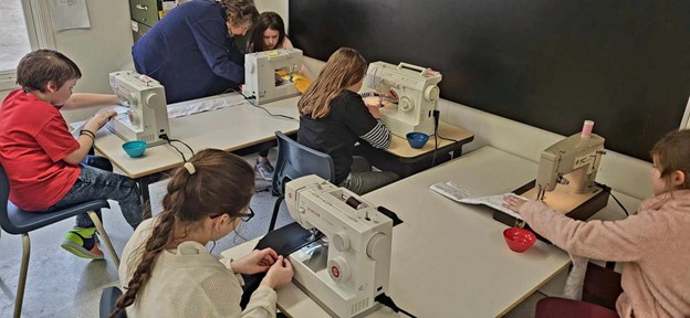Keswick Ridge School students learn to sew during the school's three-week-long Enrichment Wednesday Afternoons in March and April.