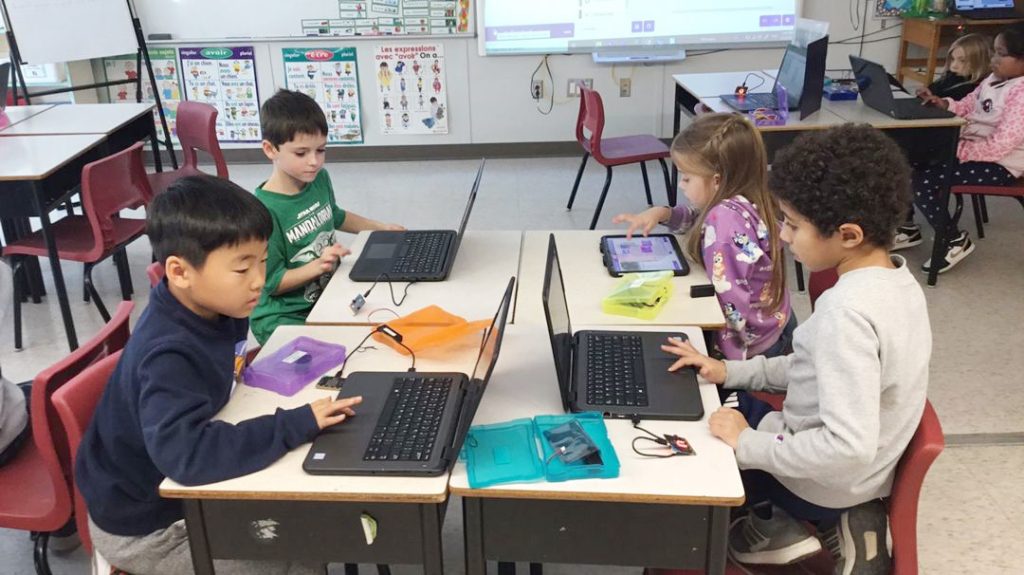 Cuffman Street Elementary students work on their laptops.