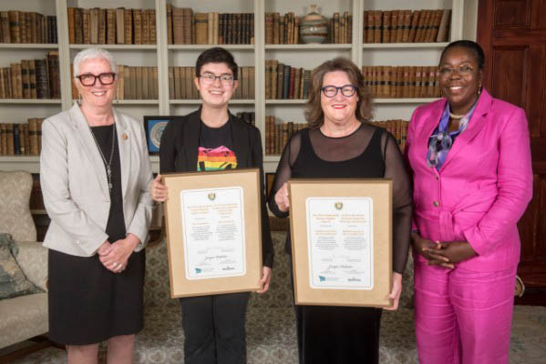 Lt.-Gov. Brenda L. Murphy; Merrit Johnson; Suzanne Chiasson, vice-president of Rendez-vous de la fierté Acadie Love; and New Brunswick Human Rights Commission chair Phylomène Zangio.