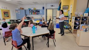 ASD-W Digital Learning Lead Yvette Seeley-Jones teaches coding to Grade 1 and 2 students at Lincoln Elementary Community School.