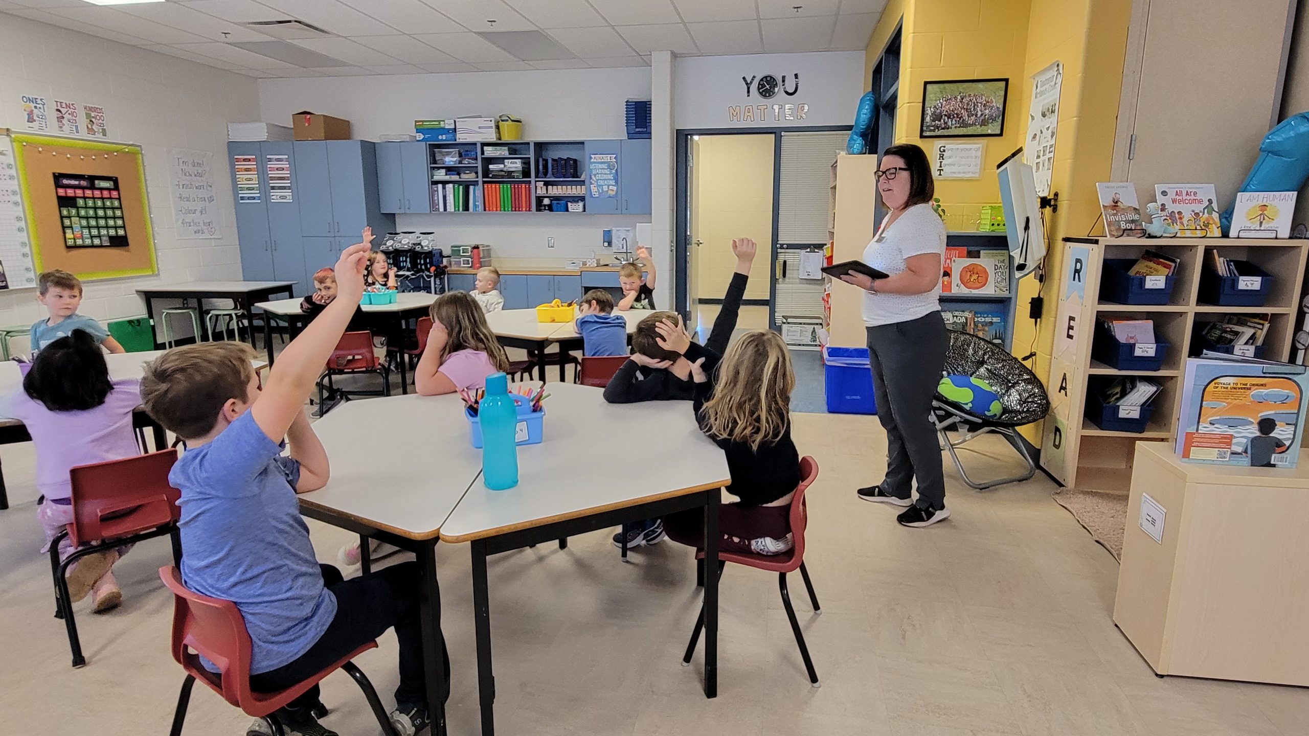 ASD-W Digital Learning Lead Yvette Seeley-Jones teaches coding to Grade 1 and 2 students at Lincoln Elementary Community School.