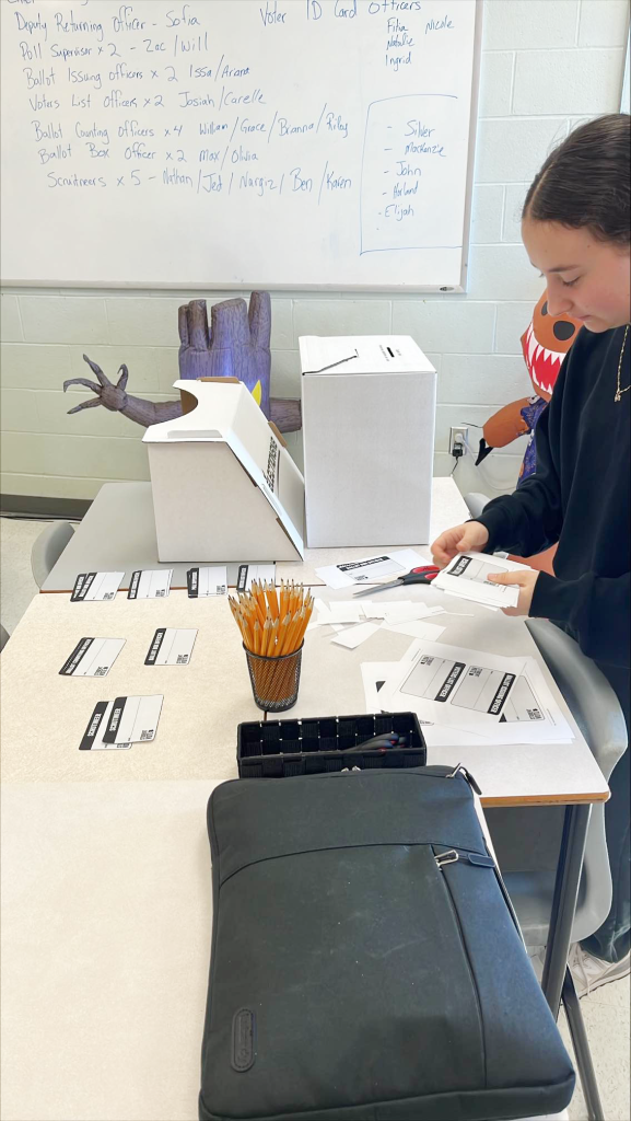 A Saint Mary's Academy student prepares for the Student Vote NB student vote on Monday, Oct. 21.