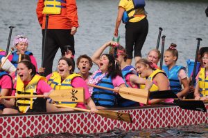 Students from Woodstock High School's dragon boat team enjoy themselves during the Race by the Sea in Saint Andrews this past September. Photo Credit: Lisa Porter