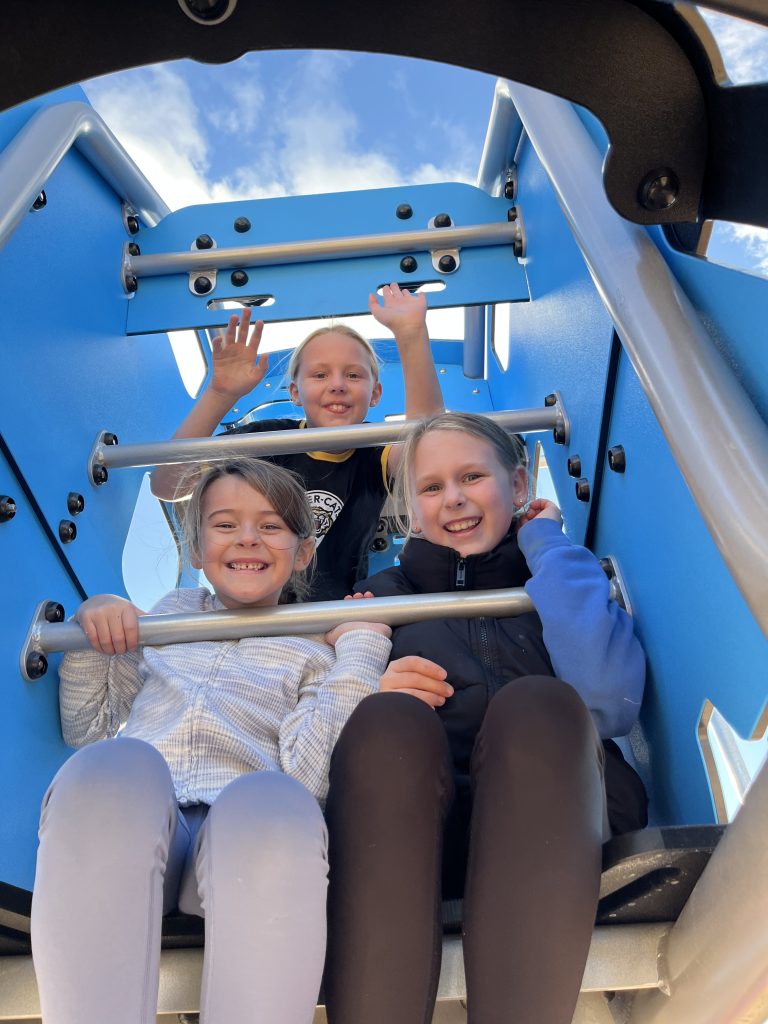 Students play in the refurbished McAdam Elementary School playground on Thursday, Nov. 7.