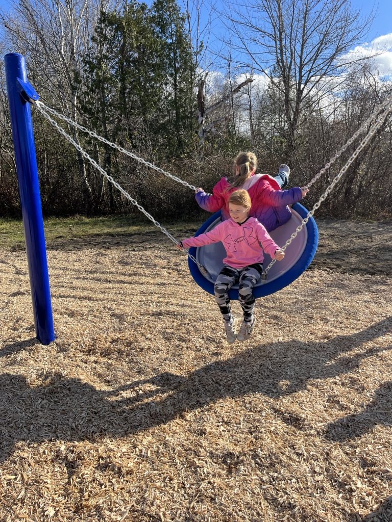 Students play in the refurbished McAdam Elementary School playground on Thursday, Nov. 7.