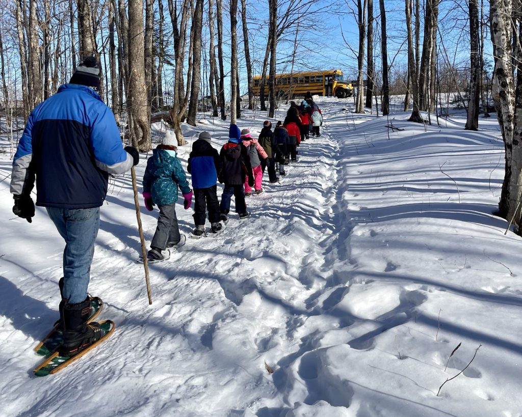 Florenceville-Bristol Elementary students snowshoe at the Meduxnekeag Valley Nature Preserve in February. Photo Credit: MRA