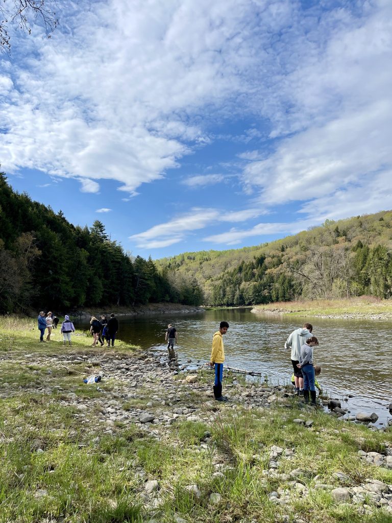 Nackawic High School Grade 9 students conduct water-quality tests on the Meduxnekeag River in May. Photo Credit: MRA