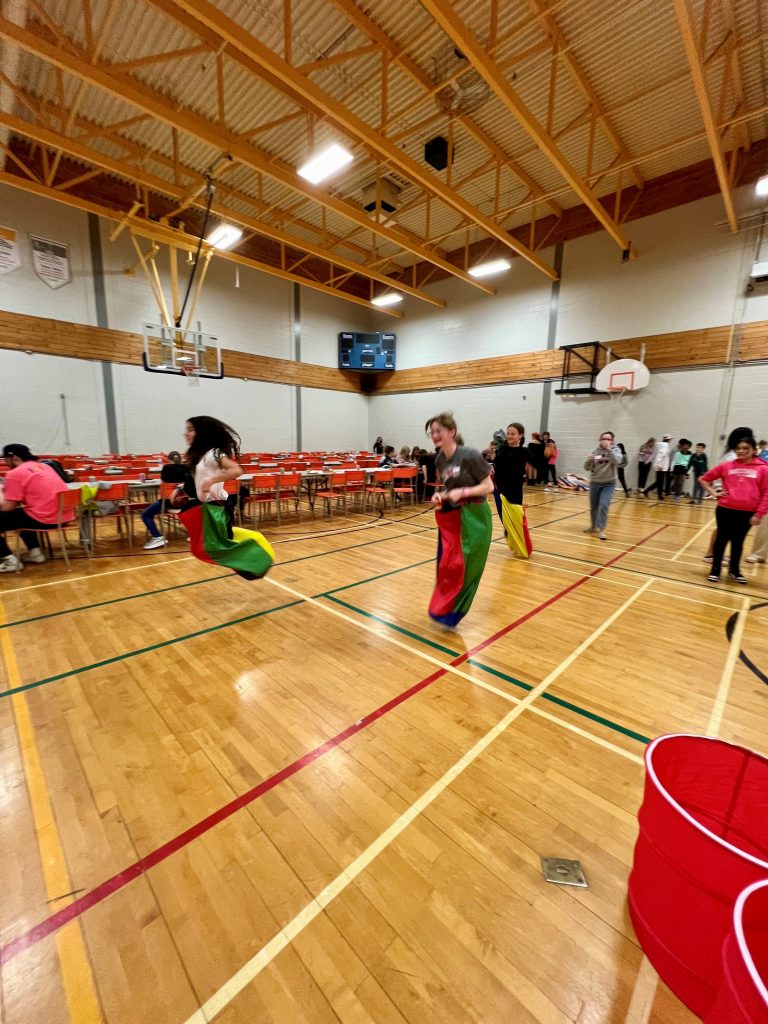 Students from Townsview School and Meduxnekeag Consolidated School have fun at a family game night last April, as part of Planet Youth drug and alcohol abuse prevention activities. Members of the Woodstock High School Planet Youth student club planned the event. Photo Credit: Alyson Ross.