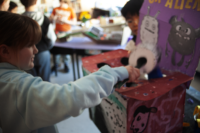 A student plays whack-a-mole at the games arcade Teacher Kristen Nixon's Grade 5 class created at Connaught Street School.