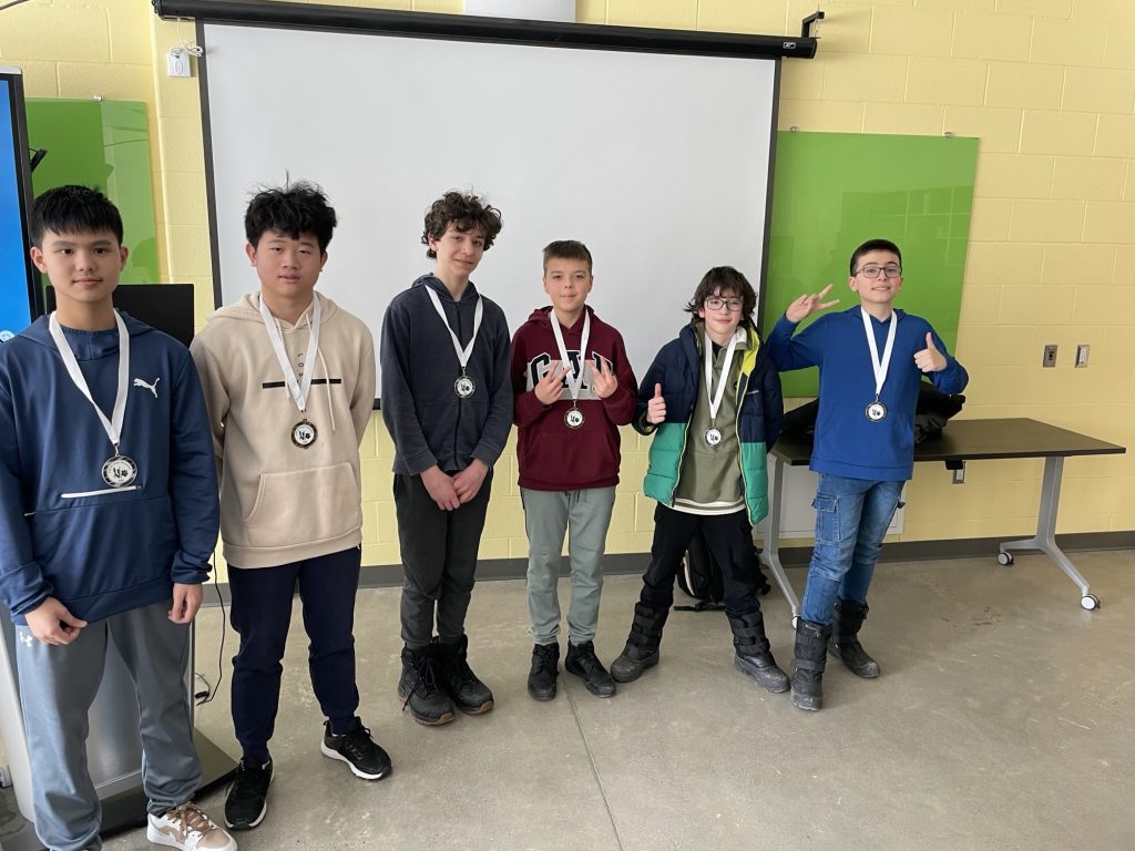 2025 FEC/OEC middle school chess tournament winners (L-R): Brian Nguyen (Grade 8 Silver), Ben Nguyen (Grade 8 Gold), Hazen Short (Grade 7 Silver), Borys Klochko (Grade 7 Gold), Raphael De Costa Marais (Grade 6 Silver), and Caesar Nasser (Grade 6 Gold).