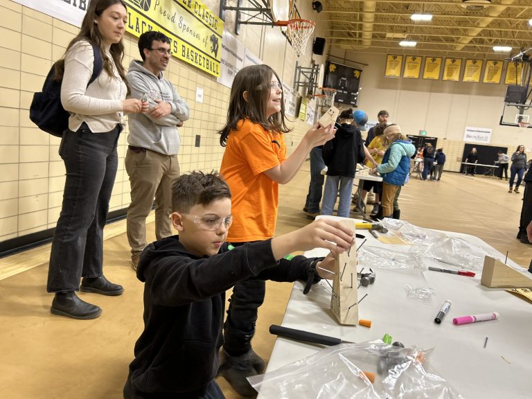 Elementary students marvel at the a “personal porcupines” they created at an intergenerational skilled trades activity designed to expose kids to the trades-- specifically carpentry--at Fredericton High School on Thursday, April 17.