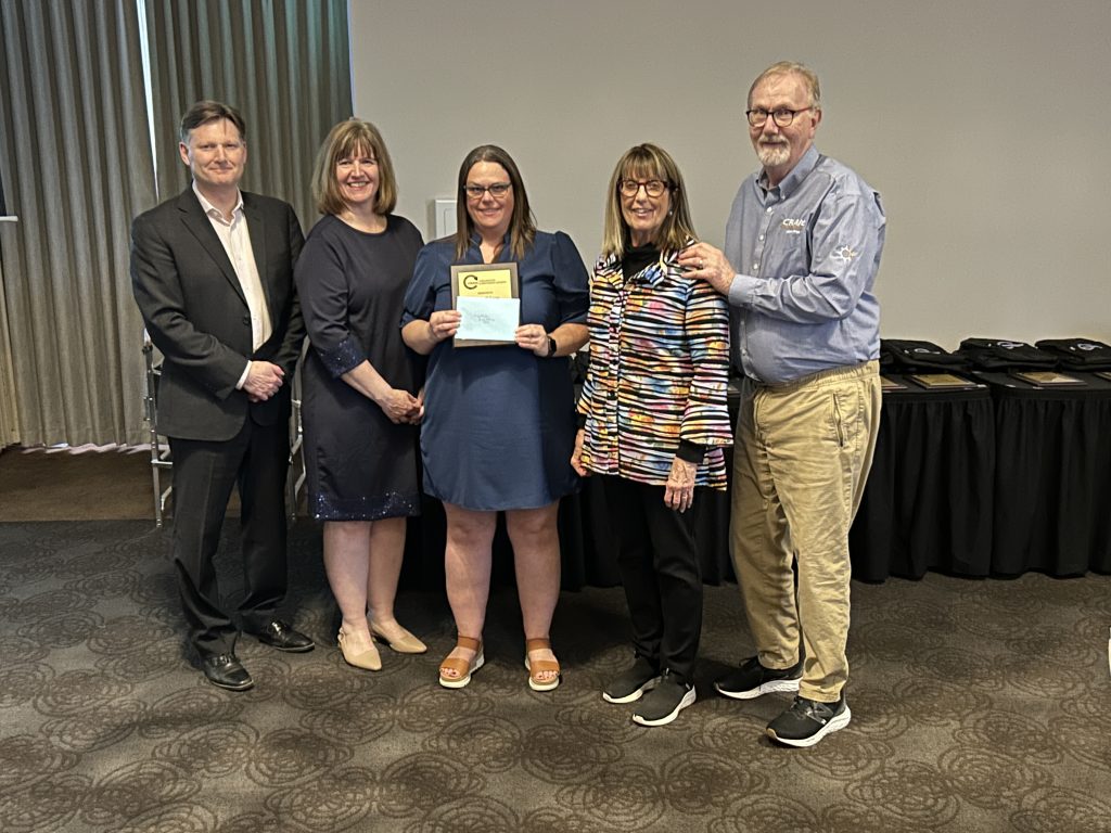 Perth-Andover Middle School behaviour intervention mentor Jenaca Deleavey, centre, flanked (L-R) by ASD-W Superintendent David McTimoney, WEC Director of Schools Julie Kilcollins, and Betty Lou and John Craig.