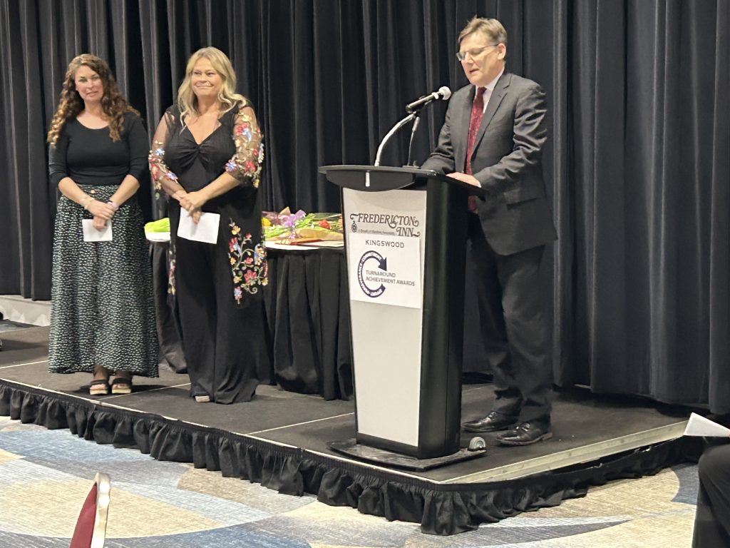 (L-R) Teachers Kristine Morris and Patti Buffett receive Kingswood Educator Awards from ASD-W Superintendent David McTimoney for their work on the Bilijk Wolastoqi Youth Support Team at George Street Middle School, during last night's Turnaround Achievement Awards ceremony at the Fredericton Inn.